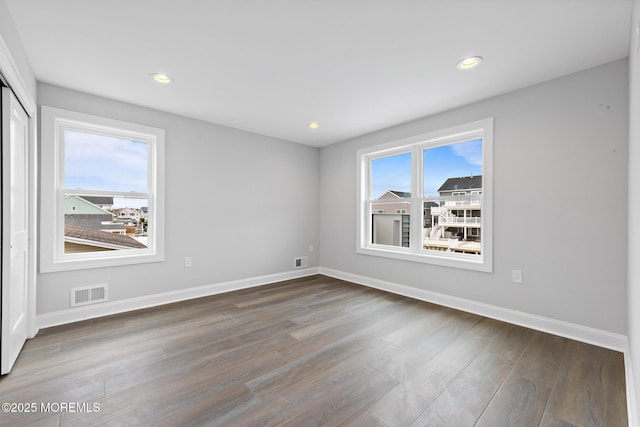 56 Gregg Dr, Beach Haven West, NJ 08050 - spare room with plenty of natural light, wood finished floors, and recessed lighting