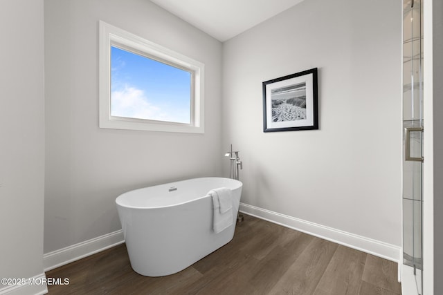 56 Gregg Dr, Beach Haven West, NJ 08050 - bathroom with wood finished floors and a freestanding bath