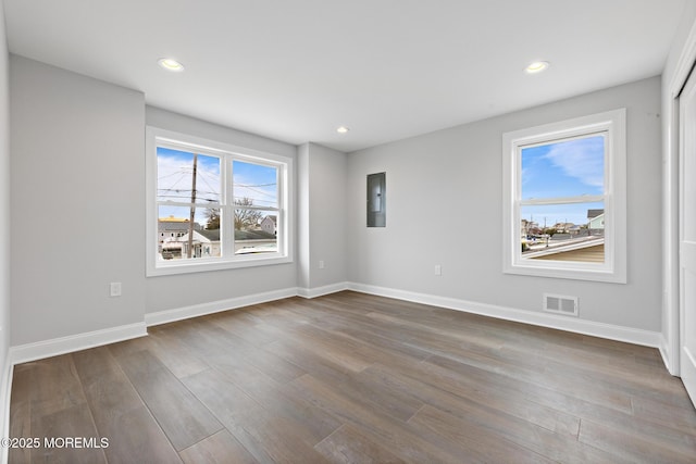 56 Gregg Dr, Beach Haven West, NJ 08050 - empty room featuring dark wood-style flooring, electric panel, and recessed lighting