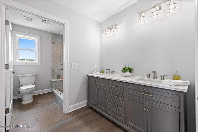 56 Gregg Dr, Beach Haven West, NJ 08050 - full bathroom with a shower stall, double vanity, and wood finished floors