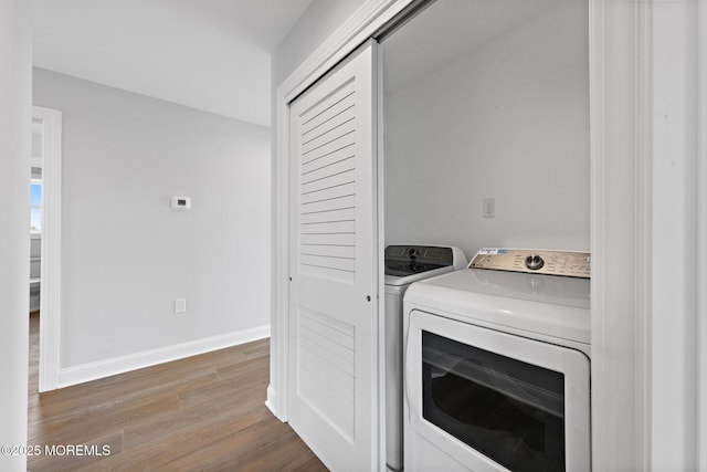 56 Gregg Dr, Beach Haven West, NJ 08050 - laundry room with wood finished floors and washer and clothes dryer