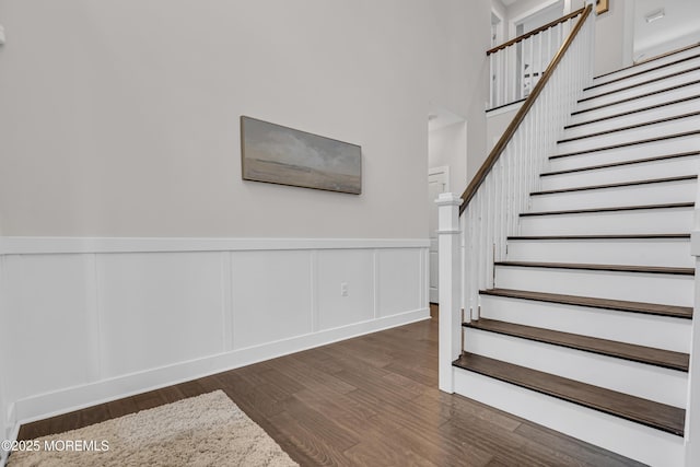 798A Warren St Unit A, Toms River, NJ 08753 - stairway featuring wood finished floors, a decorative wall, and wainscoting