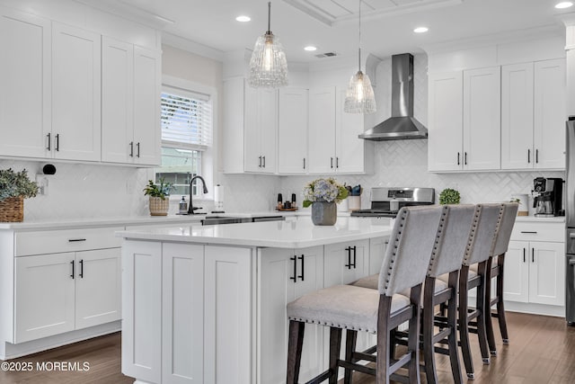 798A Warren St Unit A, Toms River, NJ 08753 - kitchen featuring wall chimney range hood, dark wood-style flooring, a center island, stainless steel range oven, and recessed lighting