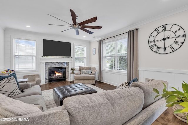 798A Warren St Unit A, Toms River, NJ 08753 - living area featuring ornamental molding, a ceiling fan, dark wood-style flooring, a premium fireplace, and wainscoting