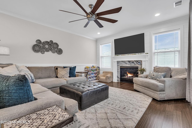 798A Warren St Unit A, Toms River, NJ 08753 - living area featuring ceiling fan, ornamental molding, dark wood finished floors, a fireplace, and wainscoting
