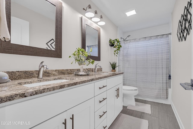 798A Warren St Unit A, Toms River, NJ 08753 - bathroom featuring double vanity and shower / tub combo with curtain