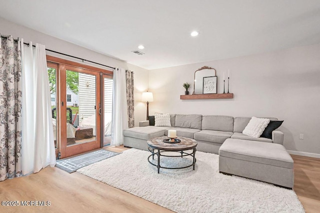 49 Scarborough Ct Unit 3, Freehold, NJ 07728 - living area with light wood finished floors and recessed lighting