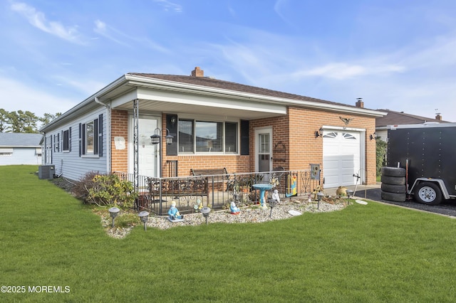 8 Tijuana Ct, Toms River, NJ 08757 - view of front facade featuring brick siding, an attached garage, covered porch, and a front lawn