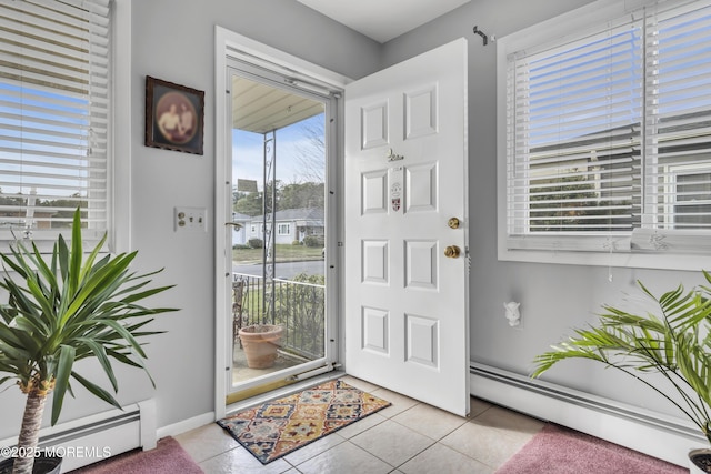 8 Tijuana Ct, Toms River, NJ 08757 - foyer entrance featuring a baseboard heating unit, tile patterned floors, and plenty of natural light