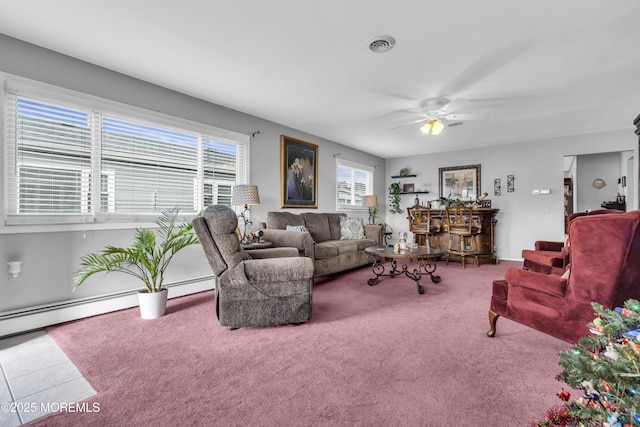 8 Tijuana Ct, Toms River, NJ 08757 - living room featuring a ceiling fan, carpet, and a baseboard heating unit