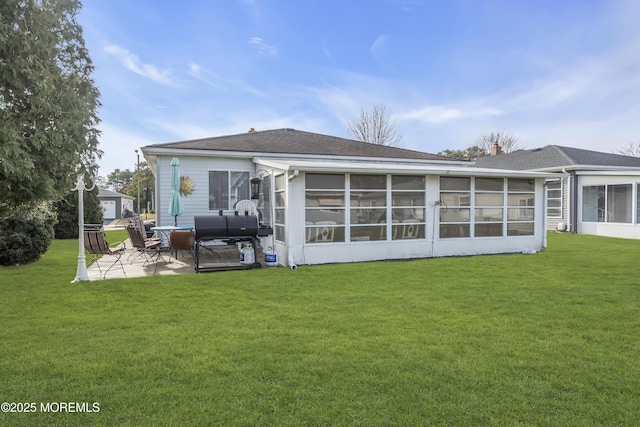 8 Tijuana Ct, Toms River, NJ 08757 - rear view of house with a patio area, a yard, and a sunroom