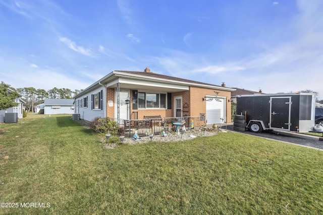 8 Tijuana Ct, Toms River, NJ 08757 - view of front of home featuring an attached garage, brick siding, covered porch, and a front lawn