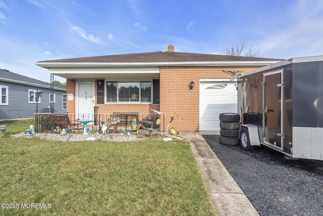 8 Tijuana Ct, Toms River, NJ 08757 - back of house featuring brick siding, a porch, an attached garage, and a lawn
