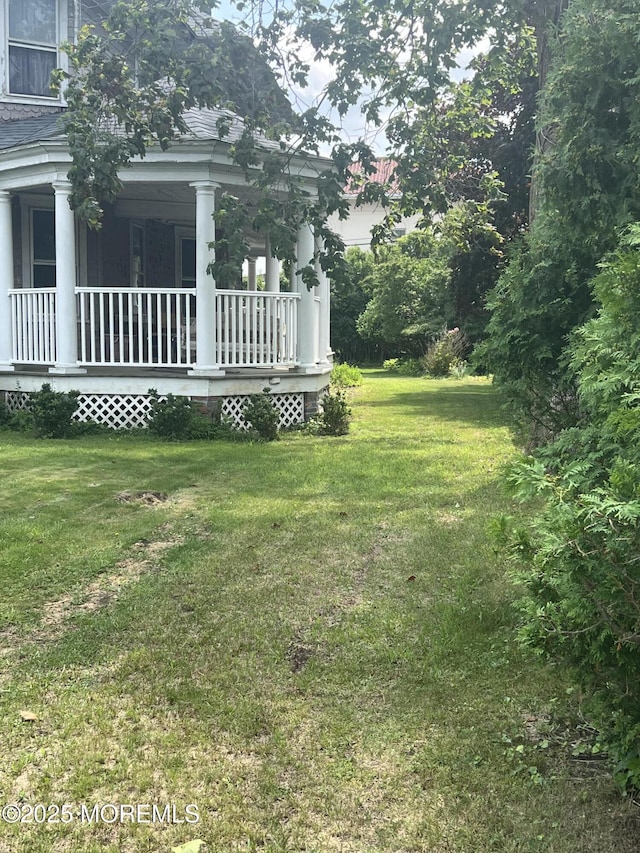 23 Milan Pl, Deal, NJ 07723 - view of grassy yard featuring a porch