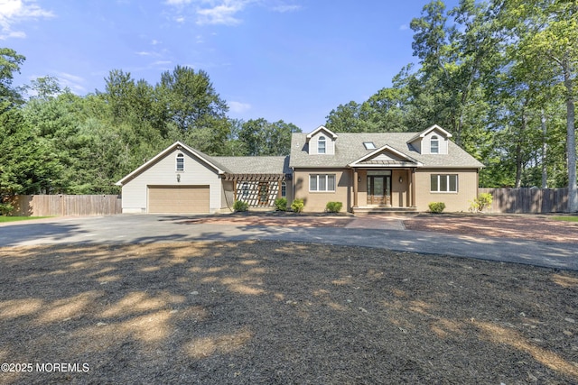 1792 Todd Rd, Toms River, NJ 08755 - cape cod house featuring driveway, a garage, brick siding, and roof with shingles