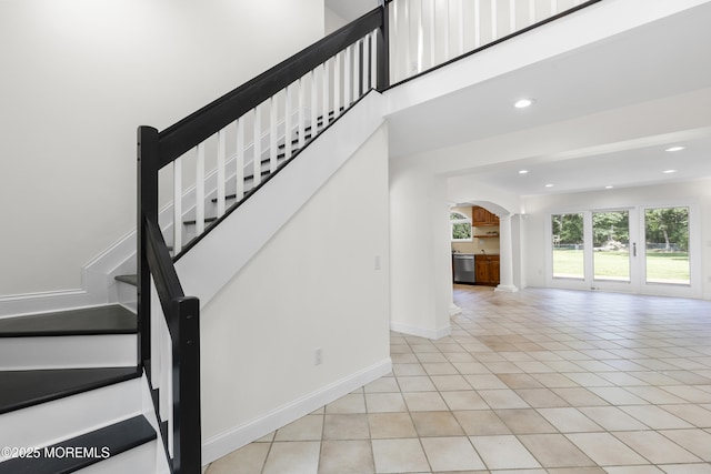 1792 Todd Rd, Toms River, NJ 08755 - staircase with arched walkways, tile patterned flooring, and recessed lighting