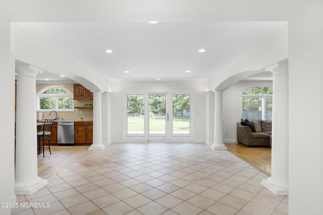 1792 Todd Rd, Toms River, NJ 08755 - living room with decorative columns, light tile patterned floors, recessed lighting, and arched walkways