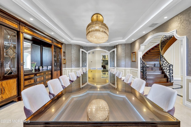 5 Champlain Ct, Lakewood, NJ 08701 - dining area featuring arched walkways, a decorative wall, recessed lighting, a chandelier, and stairway