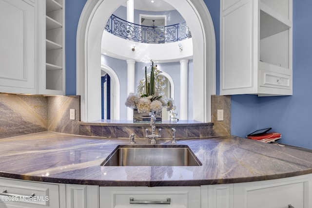 5 Champlain Ct, Lakewood, NJ 08701 - kitchen featuring dark stone counters, white cabinetry, and tasteful backsplash