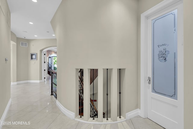 5 Champlain Ct, Lakewood, NJ 08701 - corridor featuring arched walkways and recessed lighting