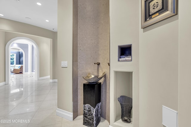 5 Champlain Ct, Lakewood, NJ 08701 - hallway featuring arched walkways, light tile patterned floors, recessed lighting, and a high ceiling