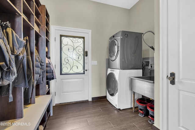 5 Champlain Ct, Lakewood, NJ 08701 - laundry room with estacked washer and dryer and dark wood finished floors