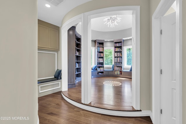 5 Champlain Ct, Lakewood, NJ 08701 - corridor with a chandelier, wood finished floors, and built in features