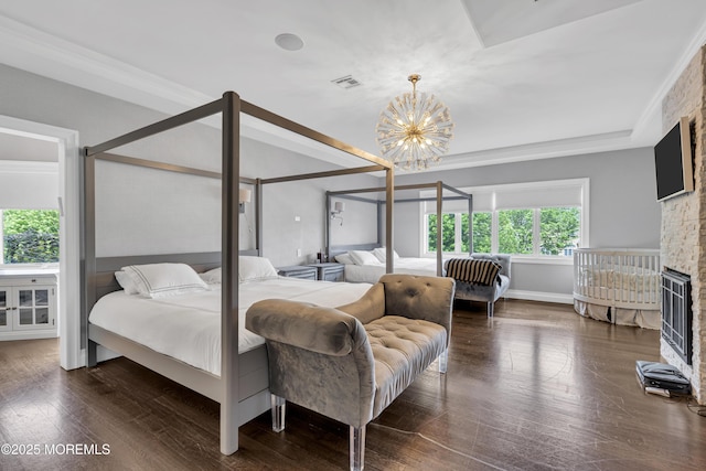 5 Champlain Ct, Lakewood, NJ 08701 - bedroom featuring a chandelier, a fireplace, crown molding, and wood finished floors