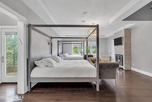 5 Champlain Ct, Lakewood, NJ 08701 - bedroom featuring wood finished floors, ornamental molding, a chandelier, and a fireplace