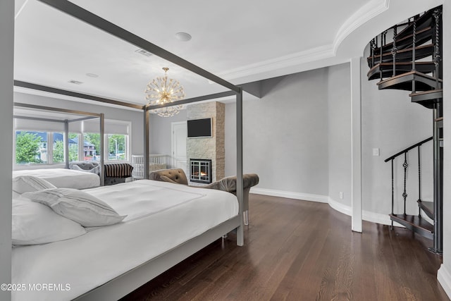 5 Champlain Ct, Lakewood, NJ 08701 - bedroom with ornamental molding, dark wood-style flooring, a chandelier, and a fireplace