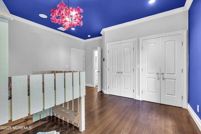 5 Champlain Ct, Lakewood, NJ 08701 - unfurnished bedroom featuring ornamental molding, multiple closets, wood finished floors, and recessed lighting