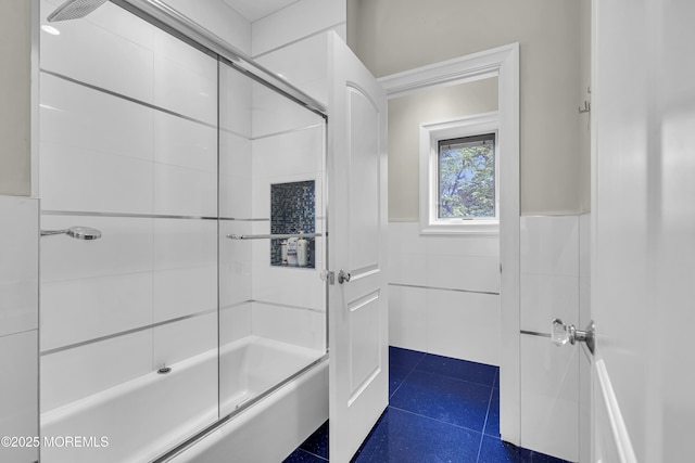 5 Champlain Ct, Lakewood, NJ 08701 - bathroom with shower / bath combination with glass door, tile walls, and a wainscoted wall