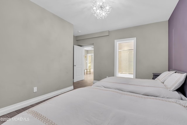 5 Champlain Ct, Lakewood, NJ 08701 - bedroom with wood finished floors and a chandelier