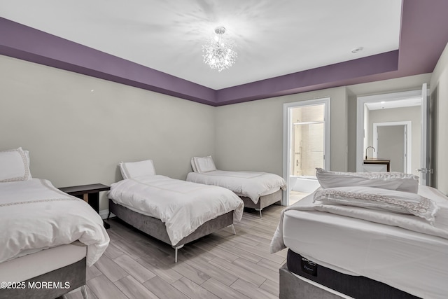 5 Champlain Ct, Lakewood, NJ 08701 - bedroom with a chandelier, light wood-type flooring, and ensuite bath