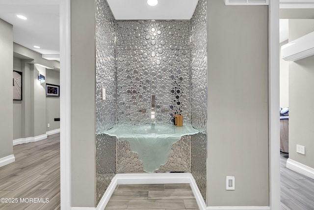 5 Champlain Ct, Lakewood, NJ 08701 - bathroom featuring wood finished floors, recessed lighting, and a wall mounted air conditioner