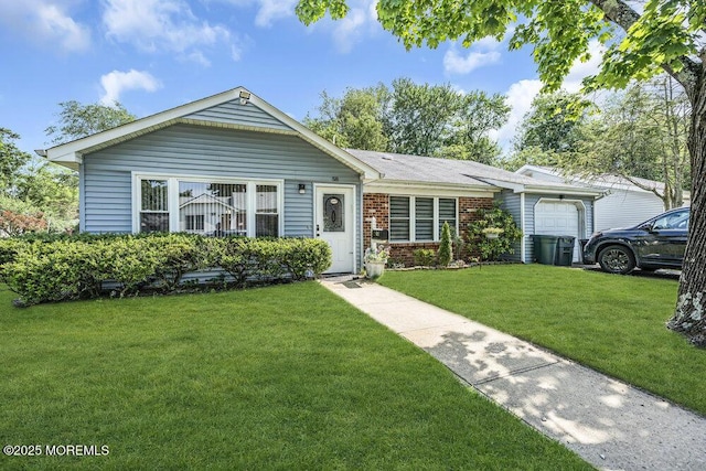 58 Hedge Dr, Lakewood, NJ 08701 - view of front of house with brick siding and a front lawn