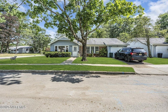 58 Hedge Dr, Lakewood, NJ 08701 - ranch-style house with driveway, an attached garage, and a front lawn