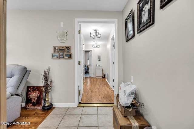58 Hedge Dr, Lakewood, NJ 08701 - hallway featuring light tile patterned floors and baseboards