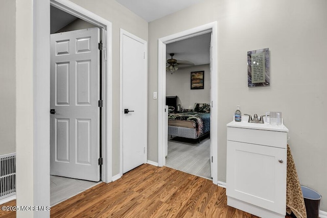 58 Hedge Dr, Lakewood, NJ 08701 - corridor with light wood finished floors and baseboards