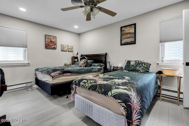 58 Hedge Dr, Lakewood, NJ 08701 - bedroom with baseboard heating, wood finished floors, recessed lighting, and ceiling fan