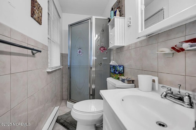 58 Hedge Dr, Lakewood, NJ 08701 - full bathroom with tile walls, a shower stall, a baseboard radiator, and vanity