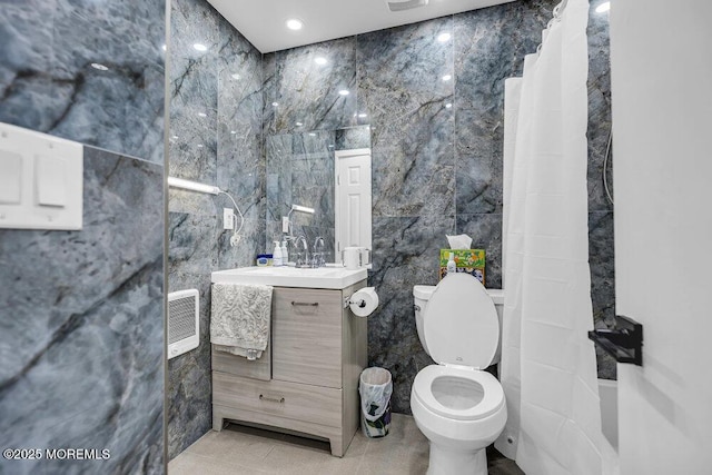 58 Hedge Dr, Lakewood, NJ 08701 - bathroom featuring tile walls, vanity, and a shower with shower curtain