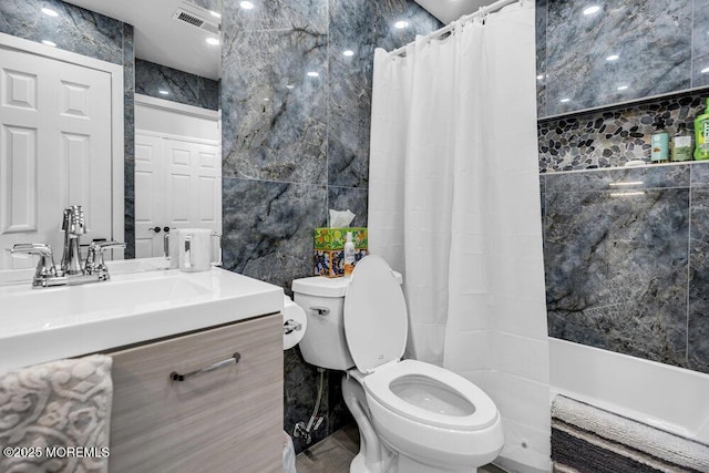 58 Hedge Dr, Lakewood, NJ 08701 - bathroom featuring tile walls, vanity, and shower / tub combo with curtain