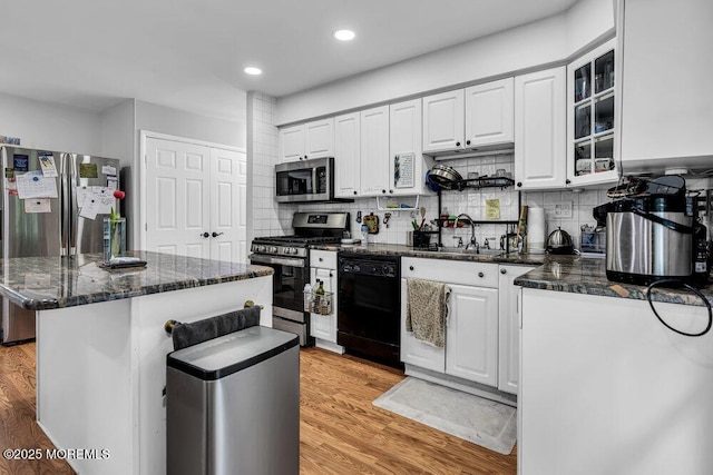 58 Hedge Dr, Lakewood, NJ 08701 - kitchen with stainless steel appliances, white cabinets, decorative backsplash, a kitchen island, and recessed lighting