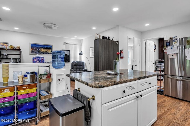 58 Hedge Dr, Lakewood, NJ 08701 - kitchen with freestanding refrigerator, light wood-style flooring, white cabinetry, open floor plan, and recessed lighting