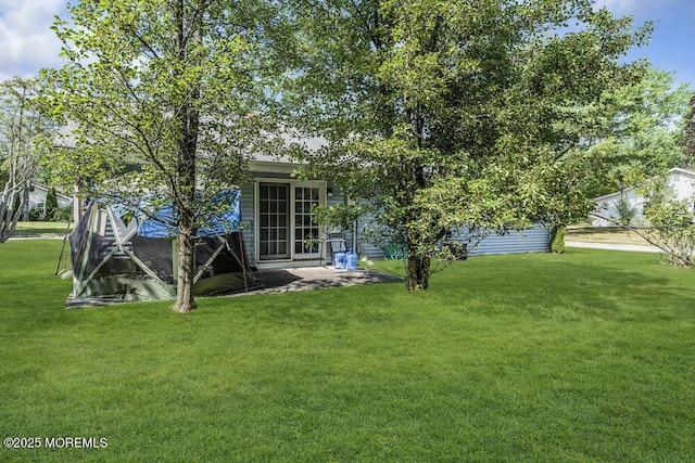 58 Hedge Dr, Lakewood, NJ 08701 - rear view of house with a lawn and a patio