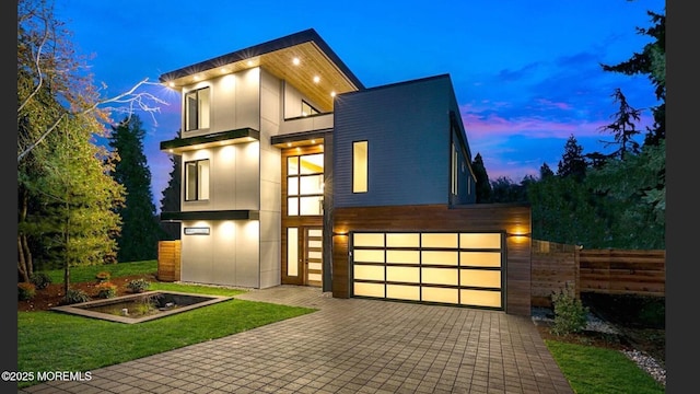 23 Royal Dr, Brick, NJ 08723 - contemporary home featuring an attached garage and decorative driveway