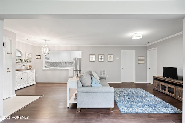 33 Honeysuckle Ln Unit 194, Red Bank, NJ 07701 - living area with a chandelier, ornamental molding, and dark wood finished floors
