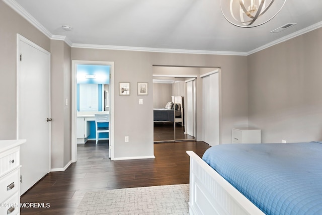 33 Honeysuckle Ln Unit 194, Red Bank, NJ 07701 - bedroom featuring crown molding, dark wood-style flooring, a chandelier, and two closets