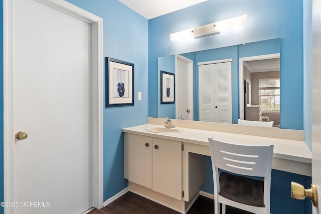 33 Honeysuckle Ln Unit 194, Red Bank, NJ 07701 - bathroom with vanity, a closet, and wood finished floors